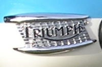Triumph Bantam Cub mouth organ style tank badge.